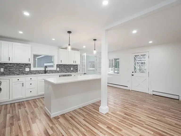 Interior renovation with new lighting and finishes