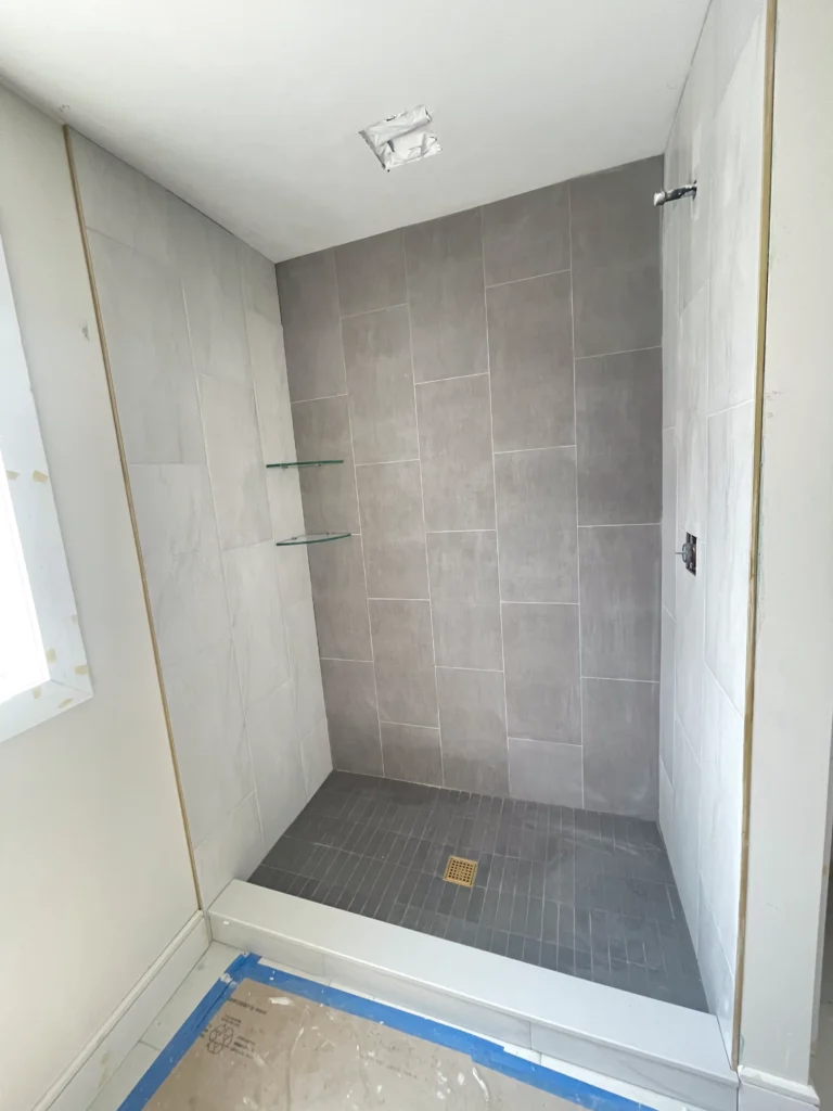 Kitchen renovation with custom cabinetry and hardware