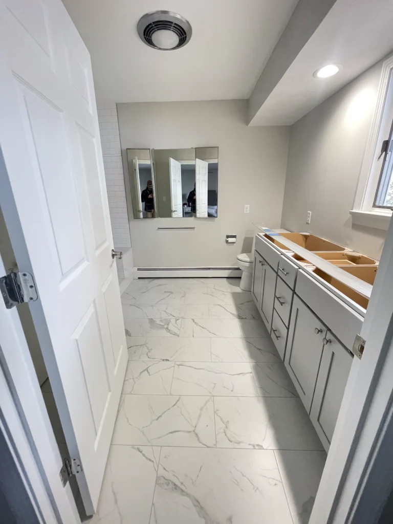 Spa-inspired bathroom renovation with rainfall shower