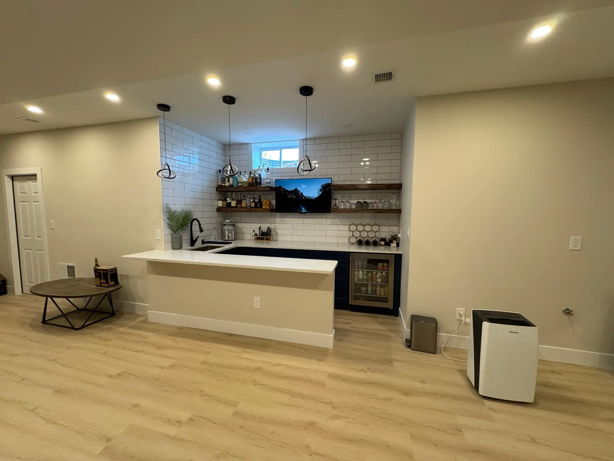 Finished basement with recessed lighting in MetroWest MA