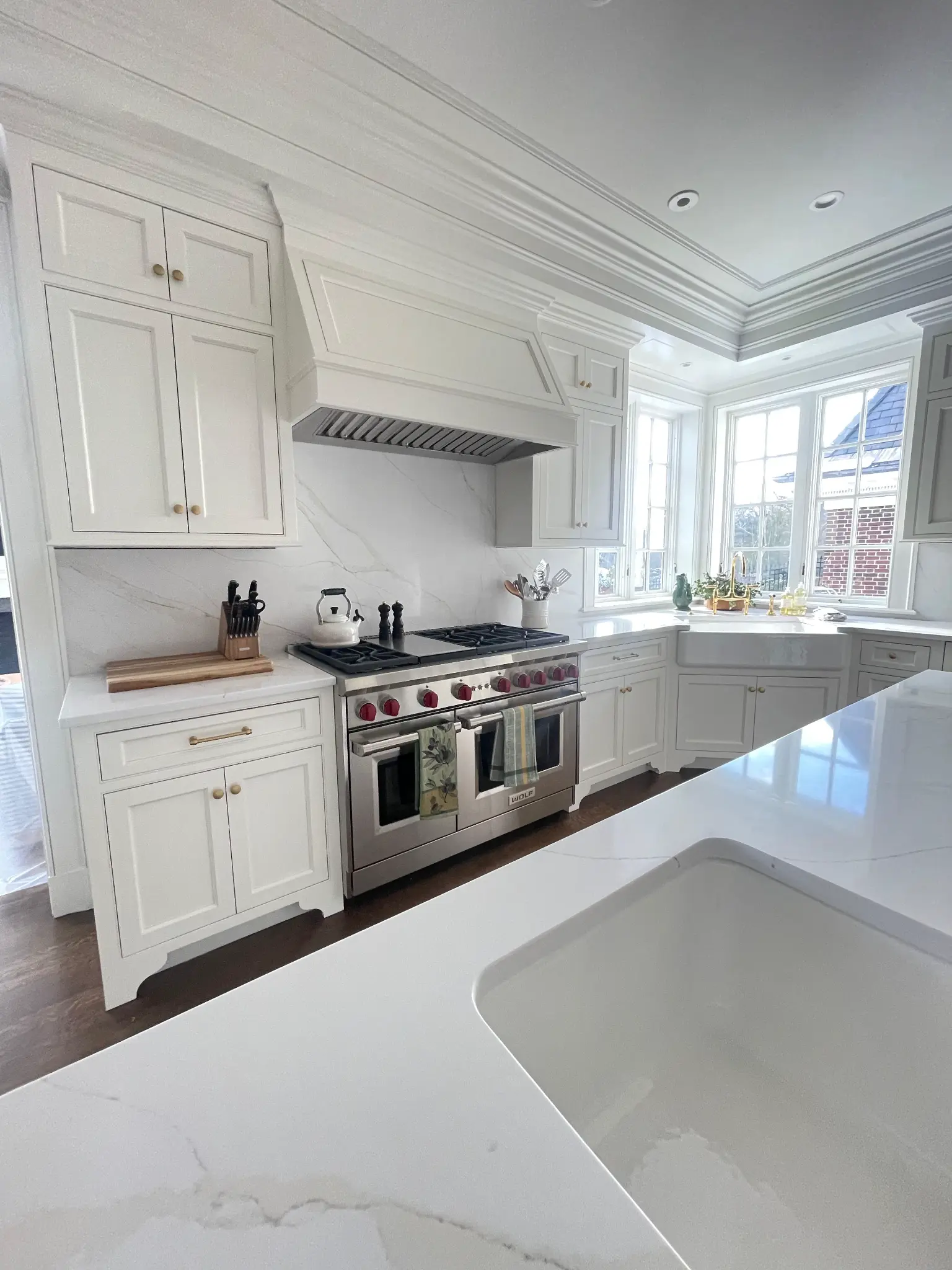 Luxury kitchen with Wolf range and custom hood in MetroWest MA