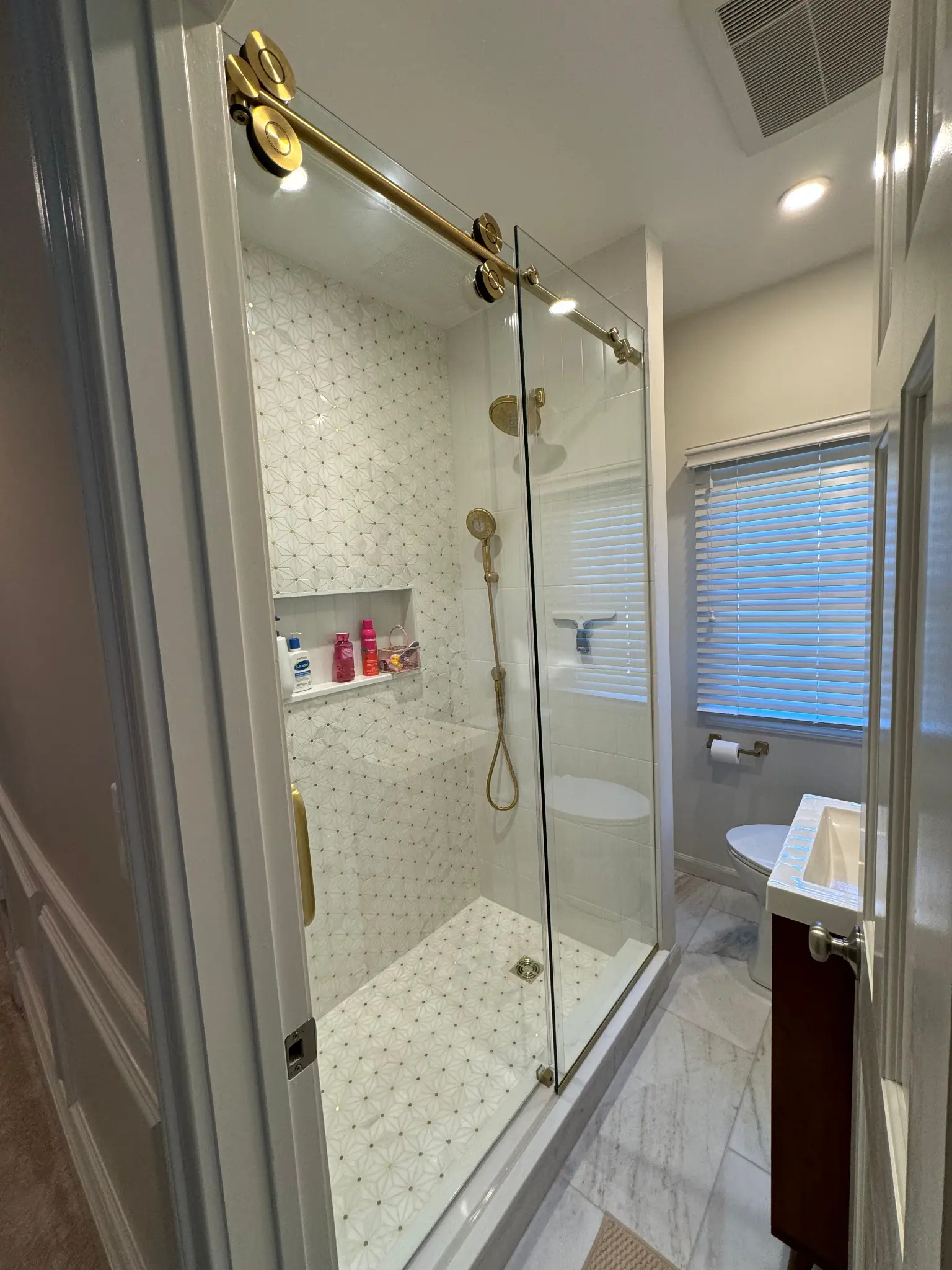 Bathroom remodel with glass shower door